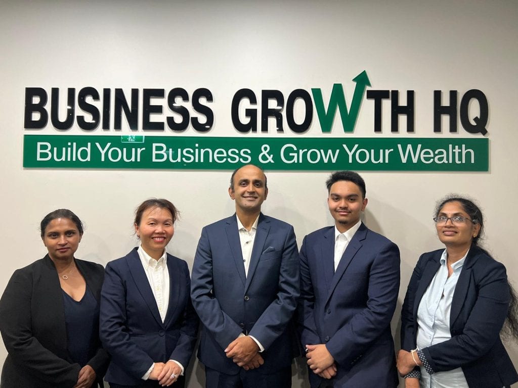 Directors Manish Bhargava and Kim Lim with the Business Growth HQ team in Bella Vista